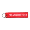 cafe 4 racer - Kiss Me Before Flight červený prívesok na kľúče - Army Surplus Klíčenka 